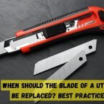 When should the blade of a utility knife be replaced